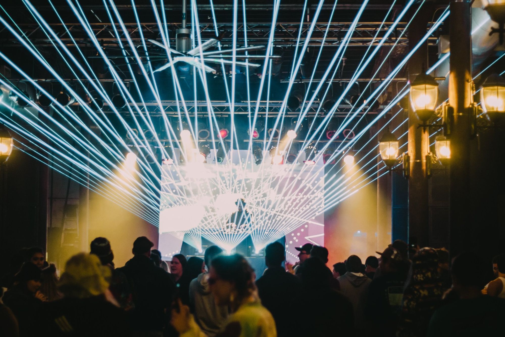 Lasers fanning over a packed crowd at one of Davin’s club sets
